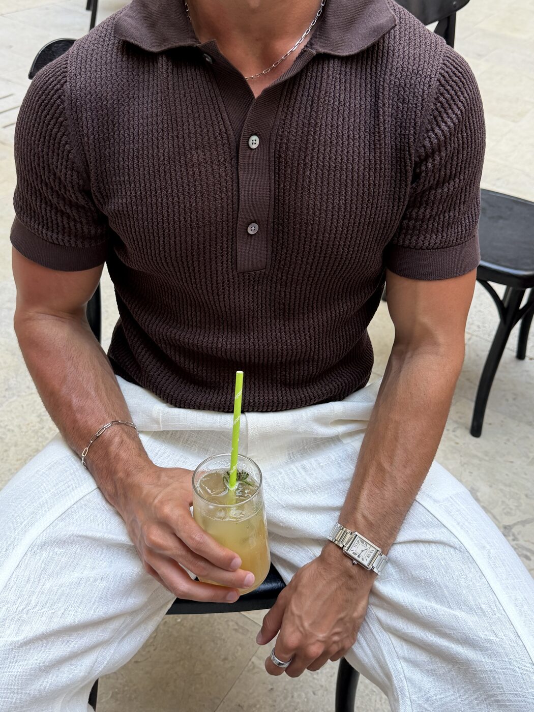 Gio Mineo — knit polo, drink in hand