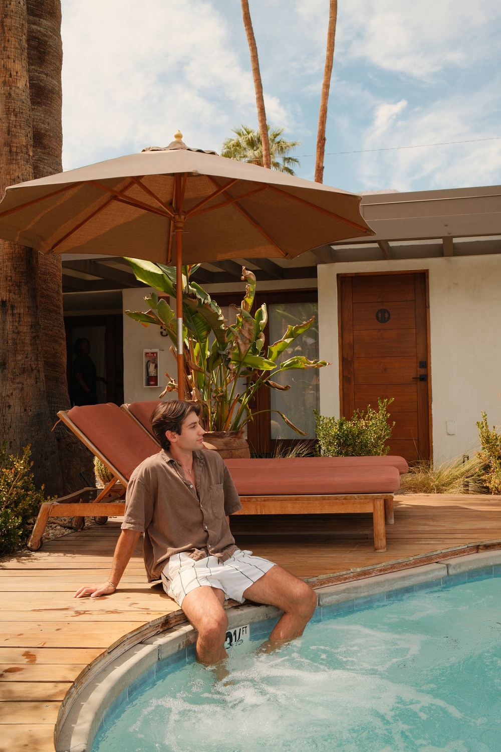 Poolside under the umbrella at Terra